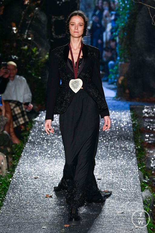 Carmen Kass walks the runway during the Valentino Haute Couture