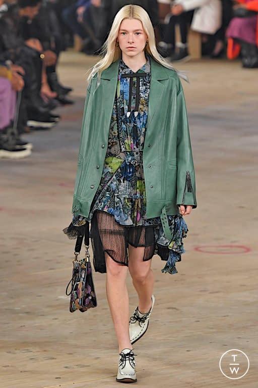 Hunter Schafer walks on the runway during the Coach New York