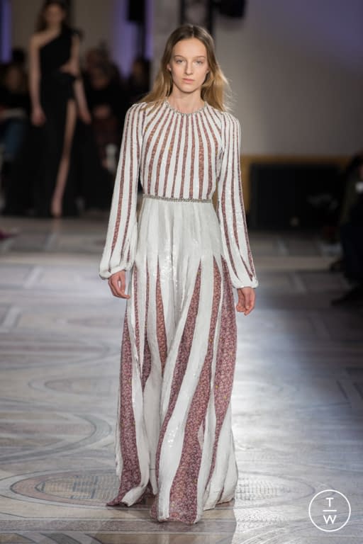 Model Hebe Flury walks on the runway during the John Galliano Fashion Show  during Paris Fashion