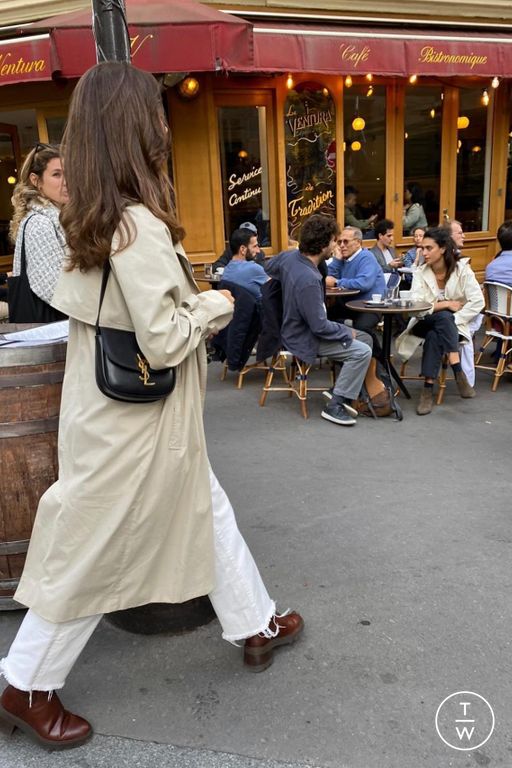 Miroslava Duma sporting the Bottega Veneta Yellow Satin Knot Clutch -  Spotted Fashion