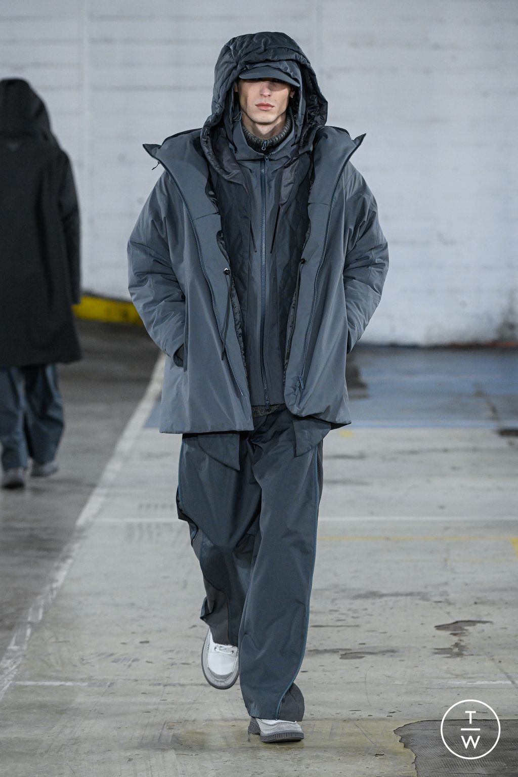 Fashion Week Paris Fall/Winter 2026 look 10 from the White Mountaineering collection menswear