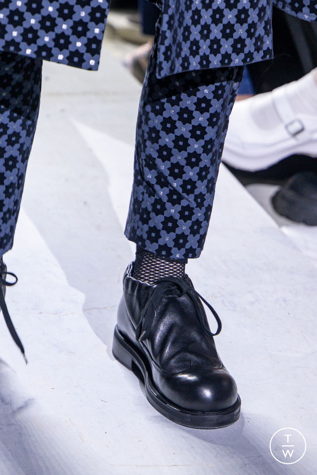 Fashion Week Paris Spring/Summer 2026 look 22 from the Comme des Garçons Homme Plus collection menswear accessories