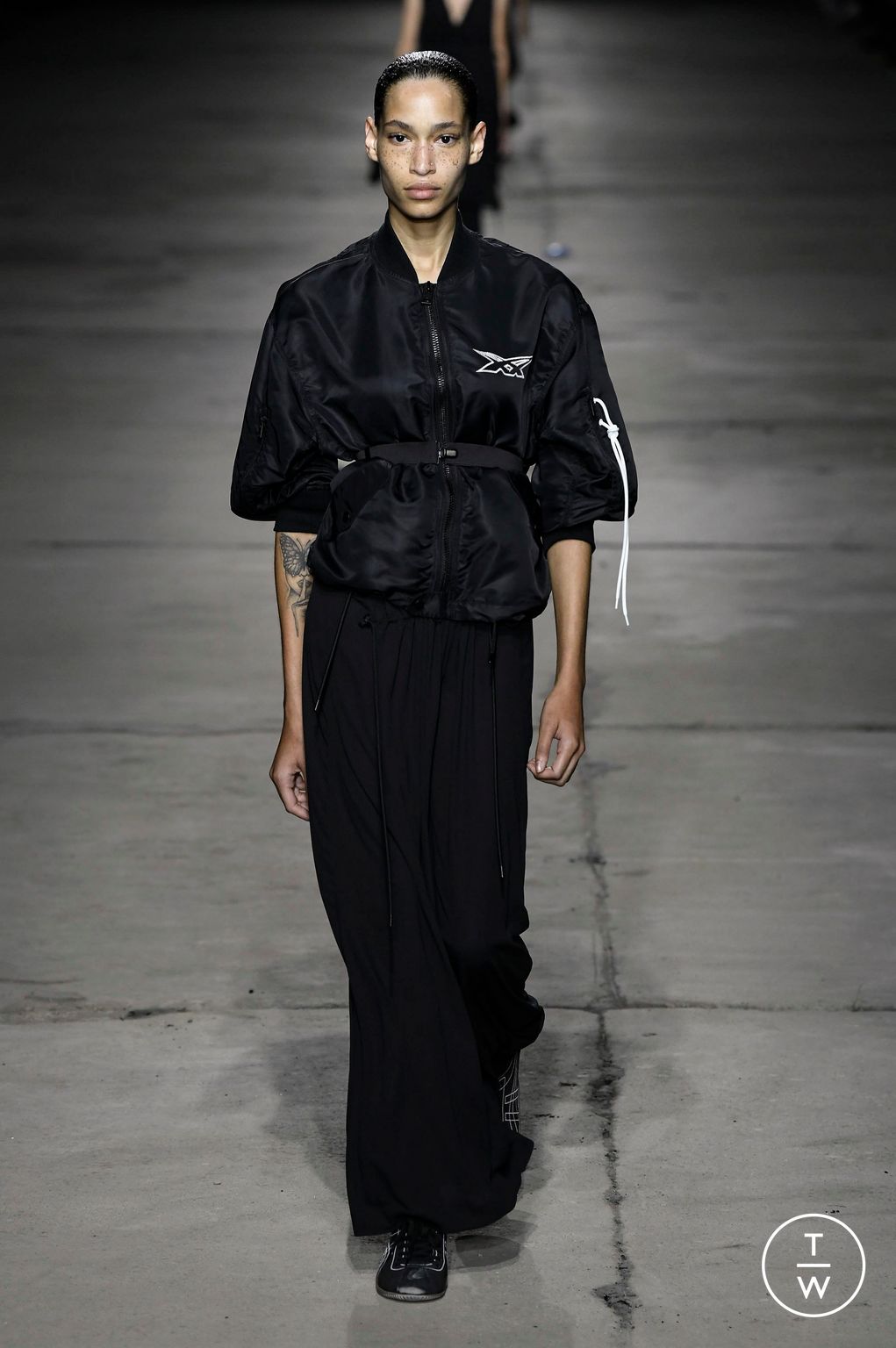 Fashion Week Milan Spring/Summer 2023 look 35 from the Onitsuka Tiger collection womenswear