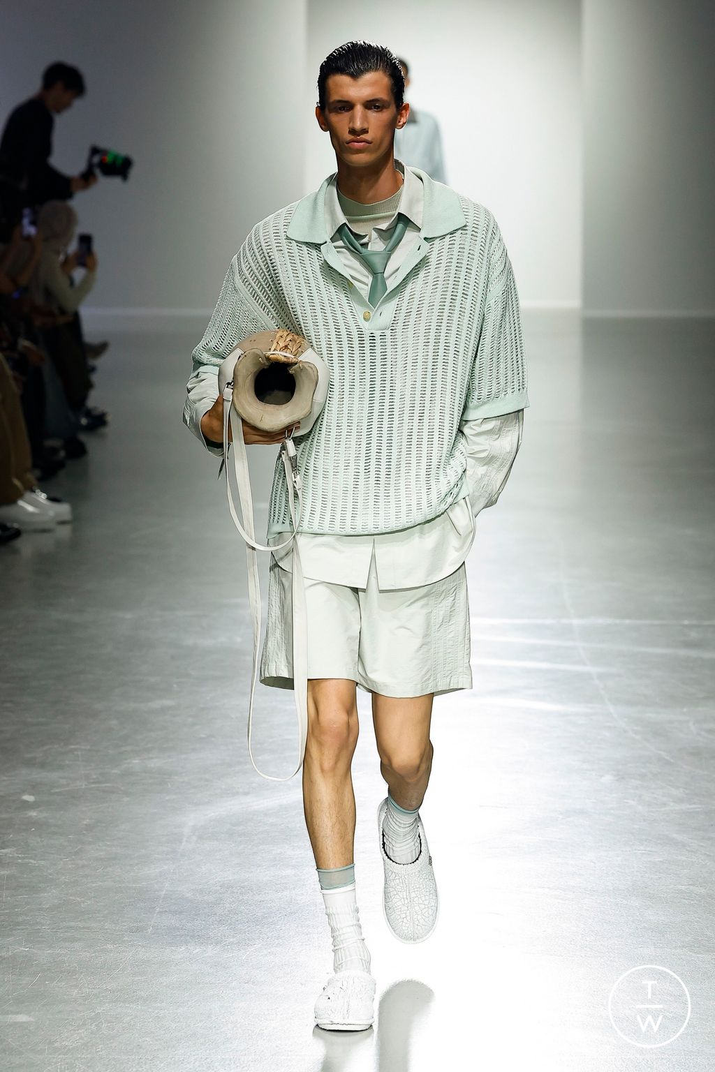 Fashion Week Paris Spring/Summer 2025 look 1 from the Feng Chen Wang collection menswear