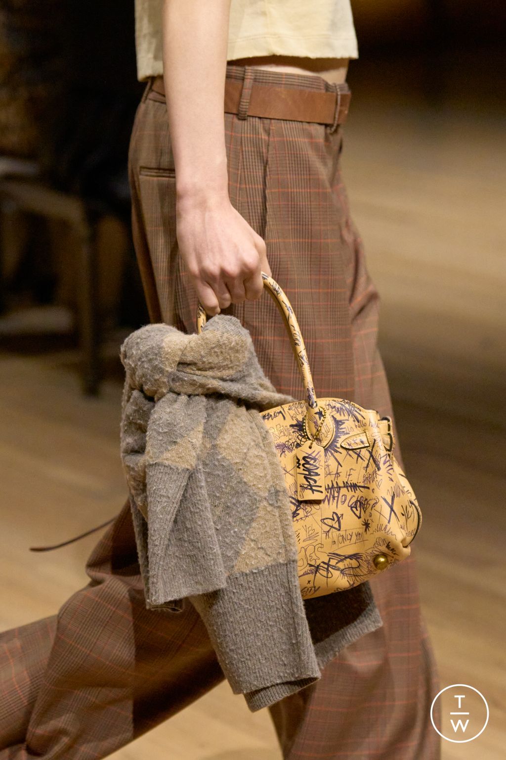 Fashion Week New York Fall/Winter 2025 look 30 from the Coach collection womenswear accessories