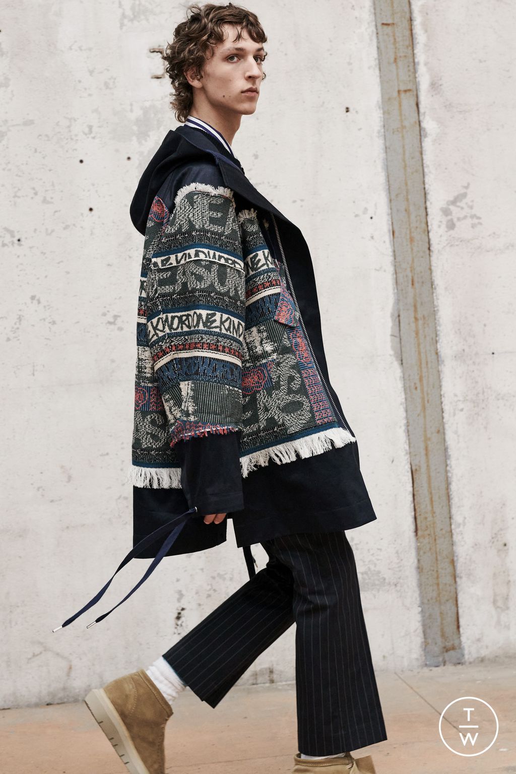 Fashion Week Paris Resort 2023 look 13 from the Sacai collection menswear