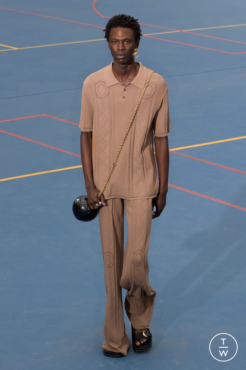 Fashion Week Paris Spring/Summer 2023 look 45 from the Marine Serre collection menswear