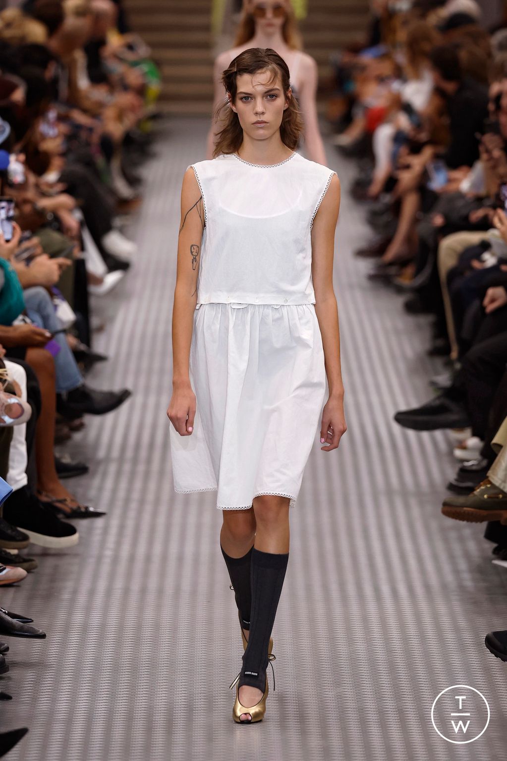 Fashion Week Paris Spring-Summer 2025 look 6 from the Miu Miu collection womenswear
