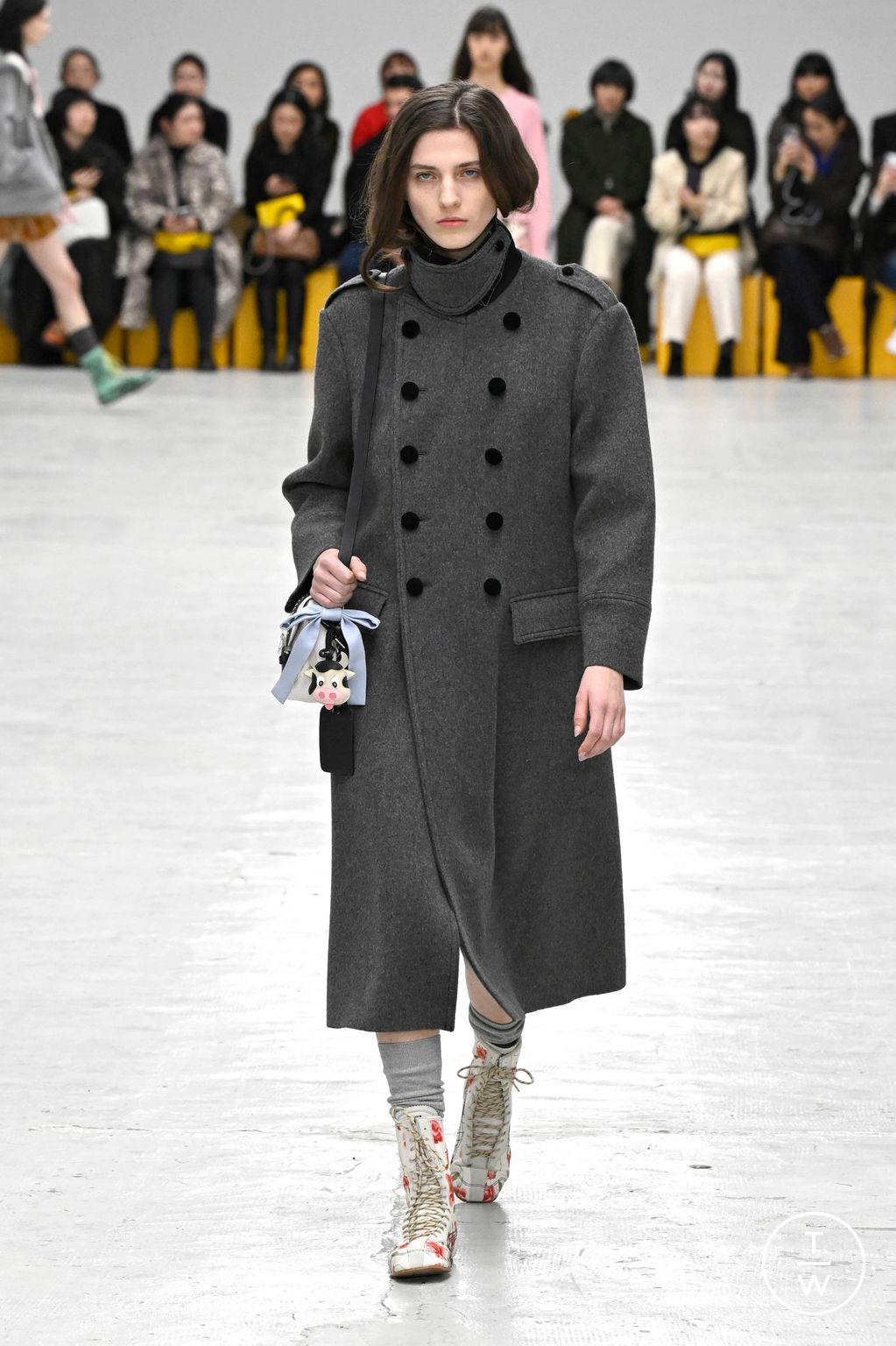 Fashion Week Milan Fall/Winter 2026 look 24 from the Onitsuka Tiger collection womenswear
