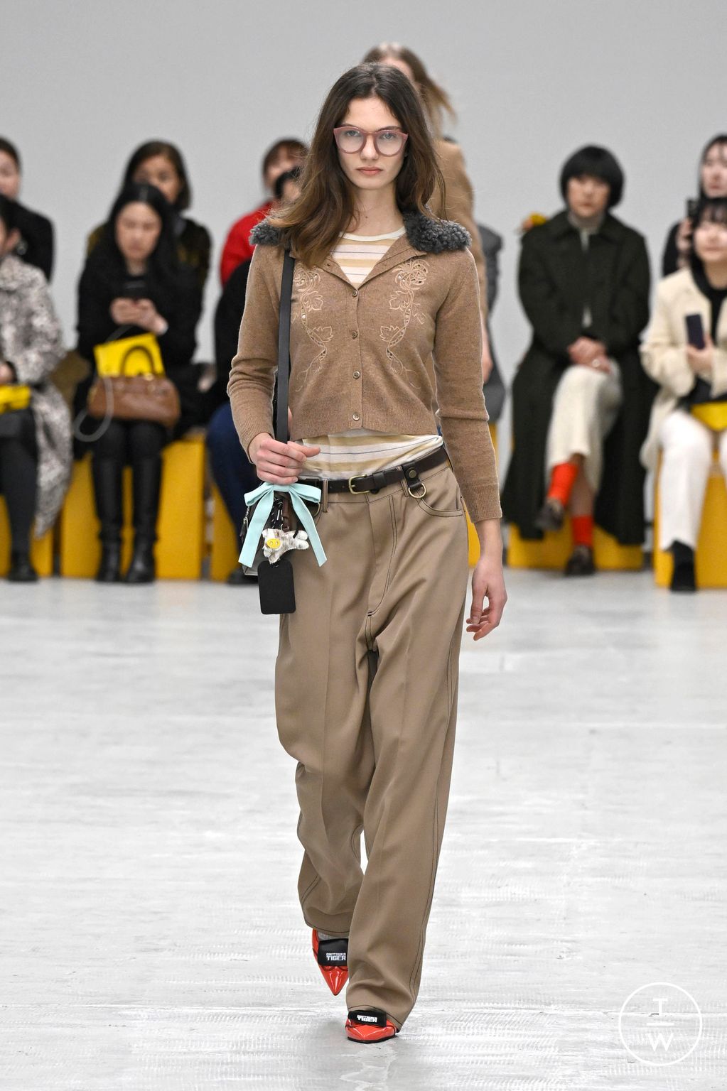 Fashion Week Milan Fall/Winter 2026 look 26 from the Onitsuka Tiger collection womenswear