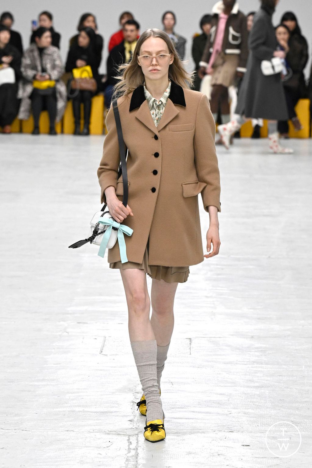 Fashion Week Milan Fall/Winter 2026 look 27 from the Onitsuka Tiger collection womenswear