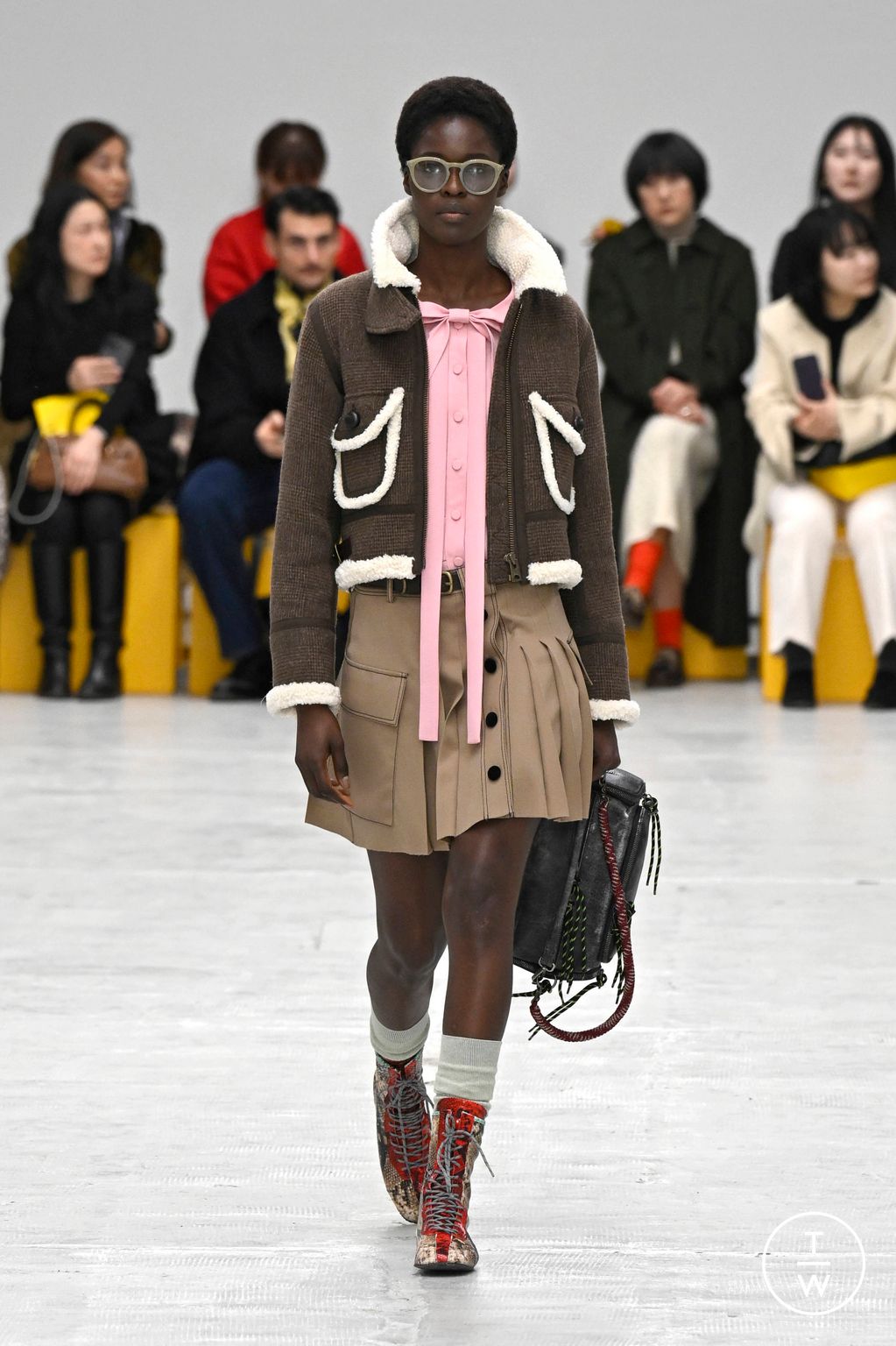 Fashion Week Milan Fall/Winter 2026 look 28 from the Onitsuka Tiger collection womenswear
