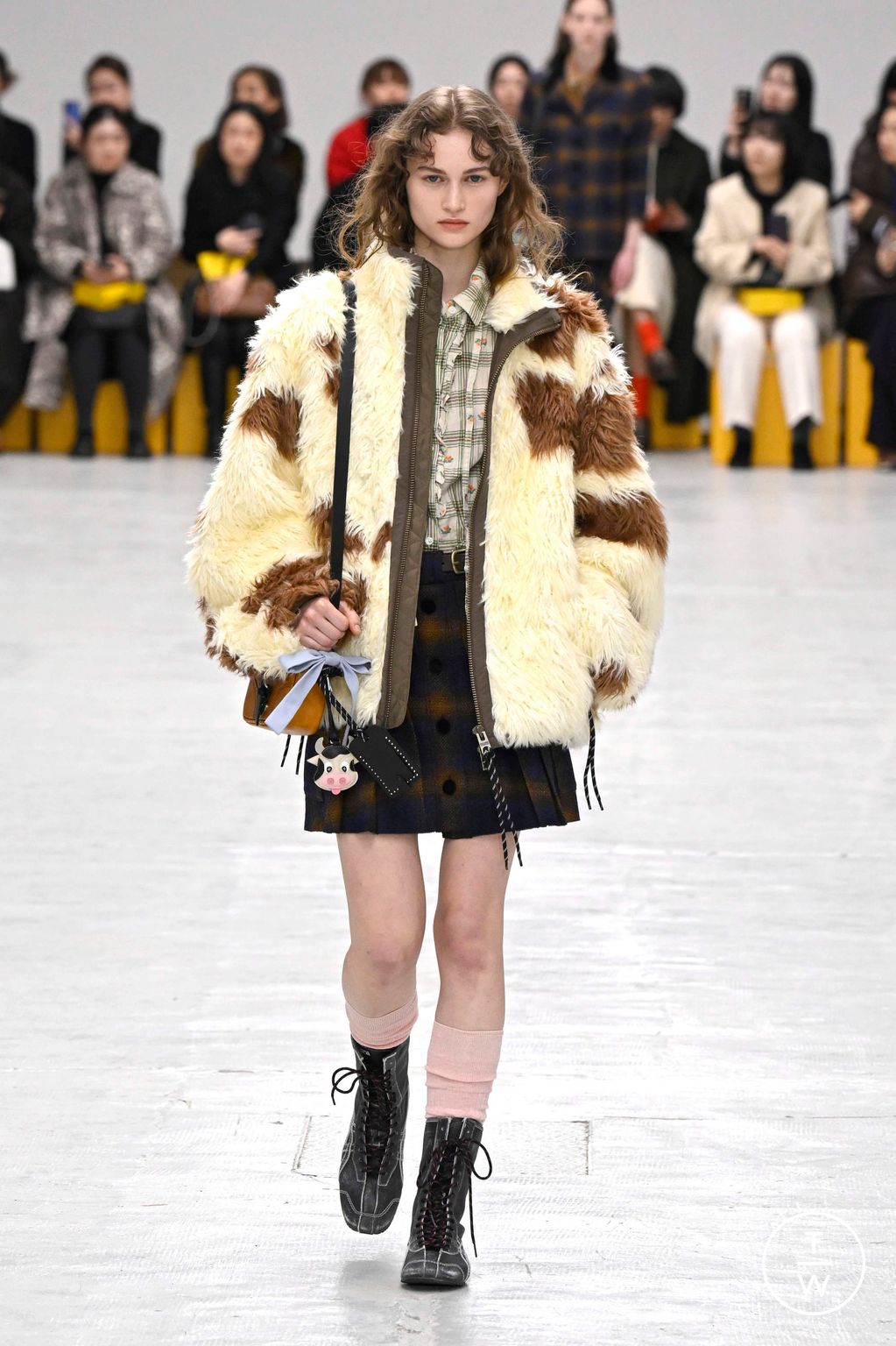 Fashion Week Milan Fall/Winter 2026 look 42 from the Onitsuka Tiger collection womenswear