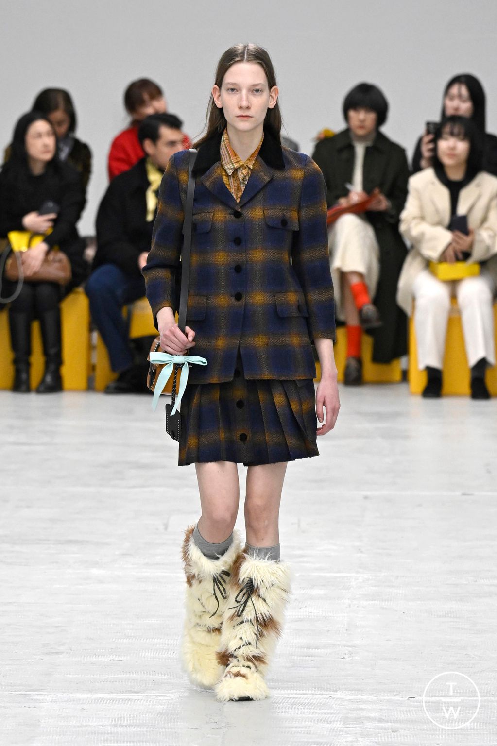 Fashion Week Milan Fall/Winter 2026 look 43 from the Onitsuka Tiger collection womenswear