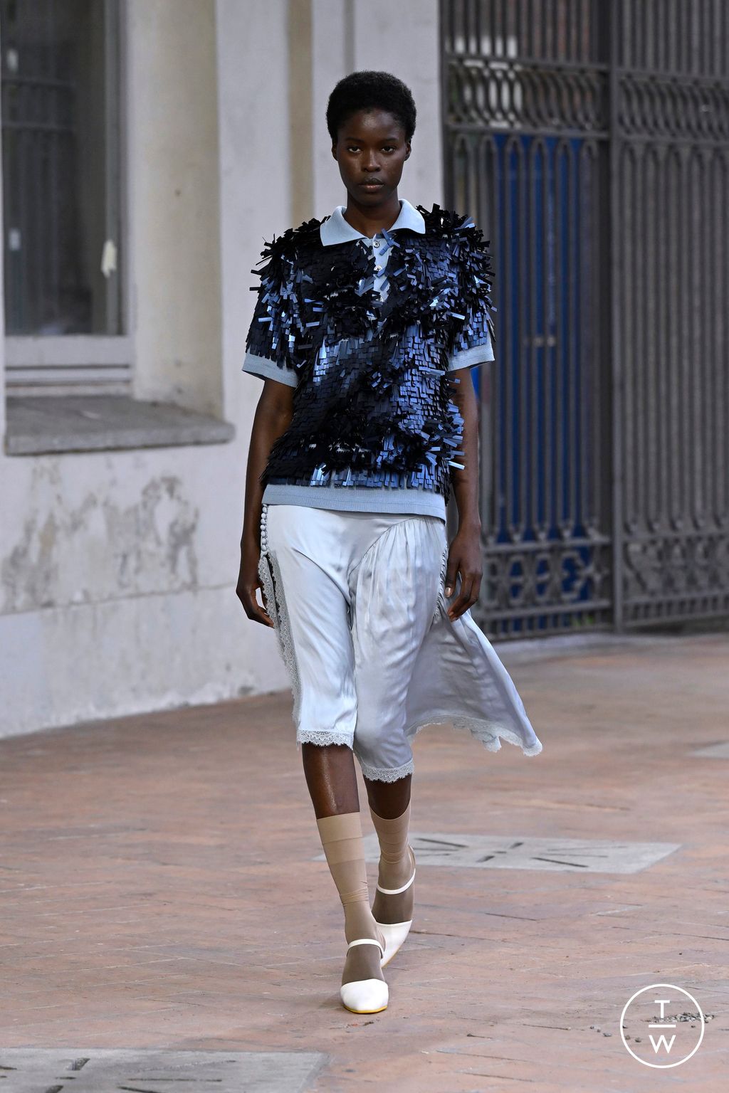 Fashion Week Milan Spring/Summer 2025 look 14 from the Onitsuka Tiger collection womenswear
