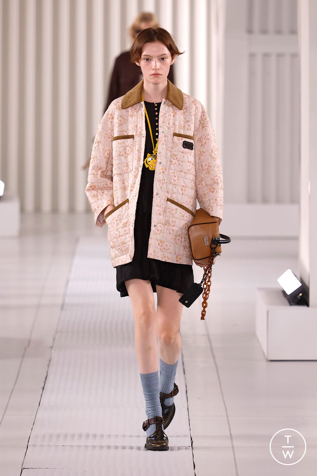 Fashion Week Milan Spring/Summer 2026 look 34 from the Onitsuka Tiger collection womenswear