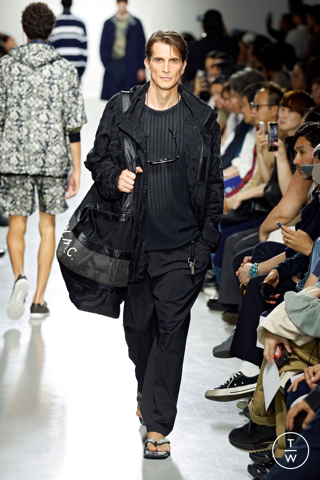 Fashion Week Paris Spring-Summer 2025 look 22 from the White Mountaineering collection menswear