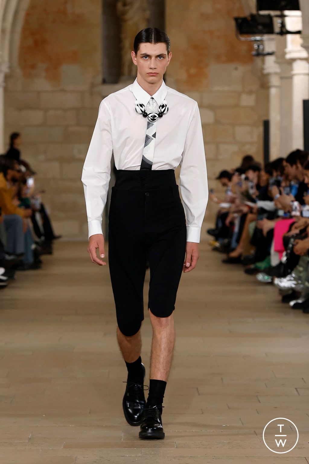 Fashion Week Paris Spring-Summer 2025 look 1 from the Wooyoungmi collection menswear