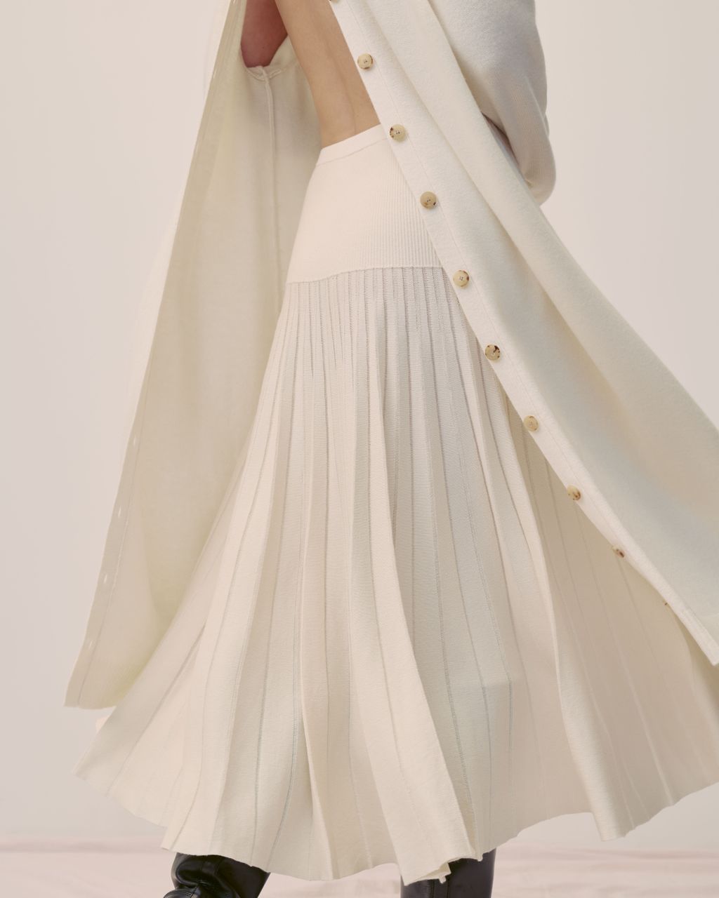 Fashion Week Paris Spring/Summer 2025 look 32 from the Eric Bompard collection womenswear