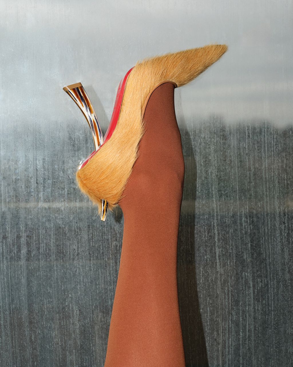 Fashion Week Paris Spring/Summer 2025 look 16 from the Christian Louboutin collection womenswear accessories