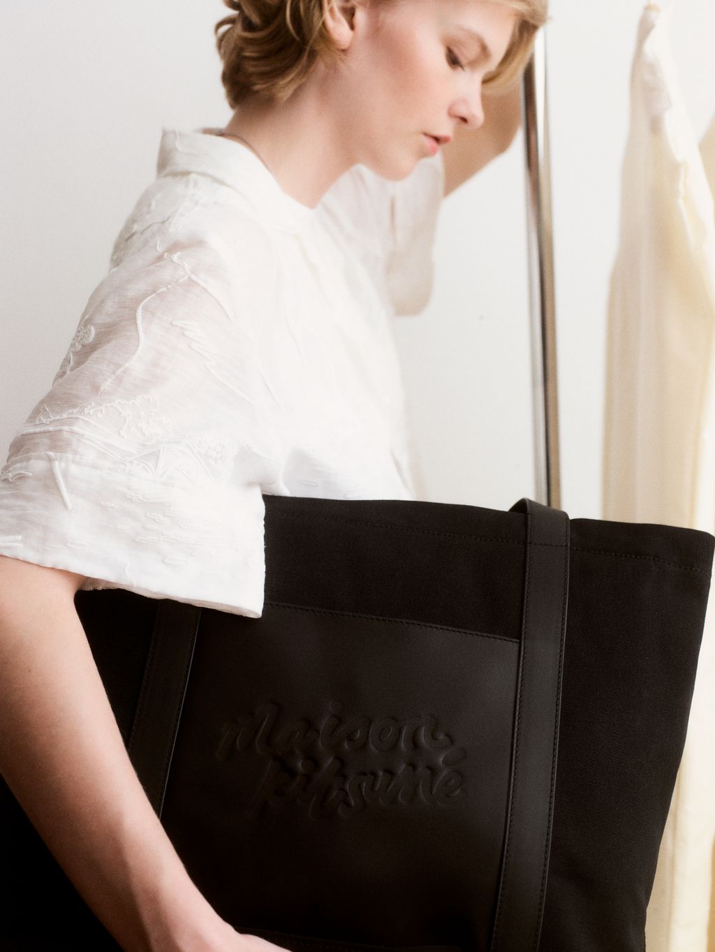 Fashion Week Paris Spring/Summer 2026 look 16 from the Maison Kitsuné collection womenswear