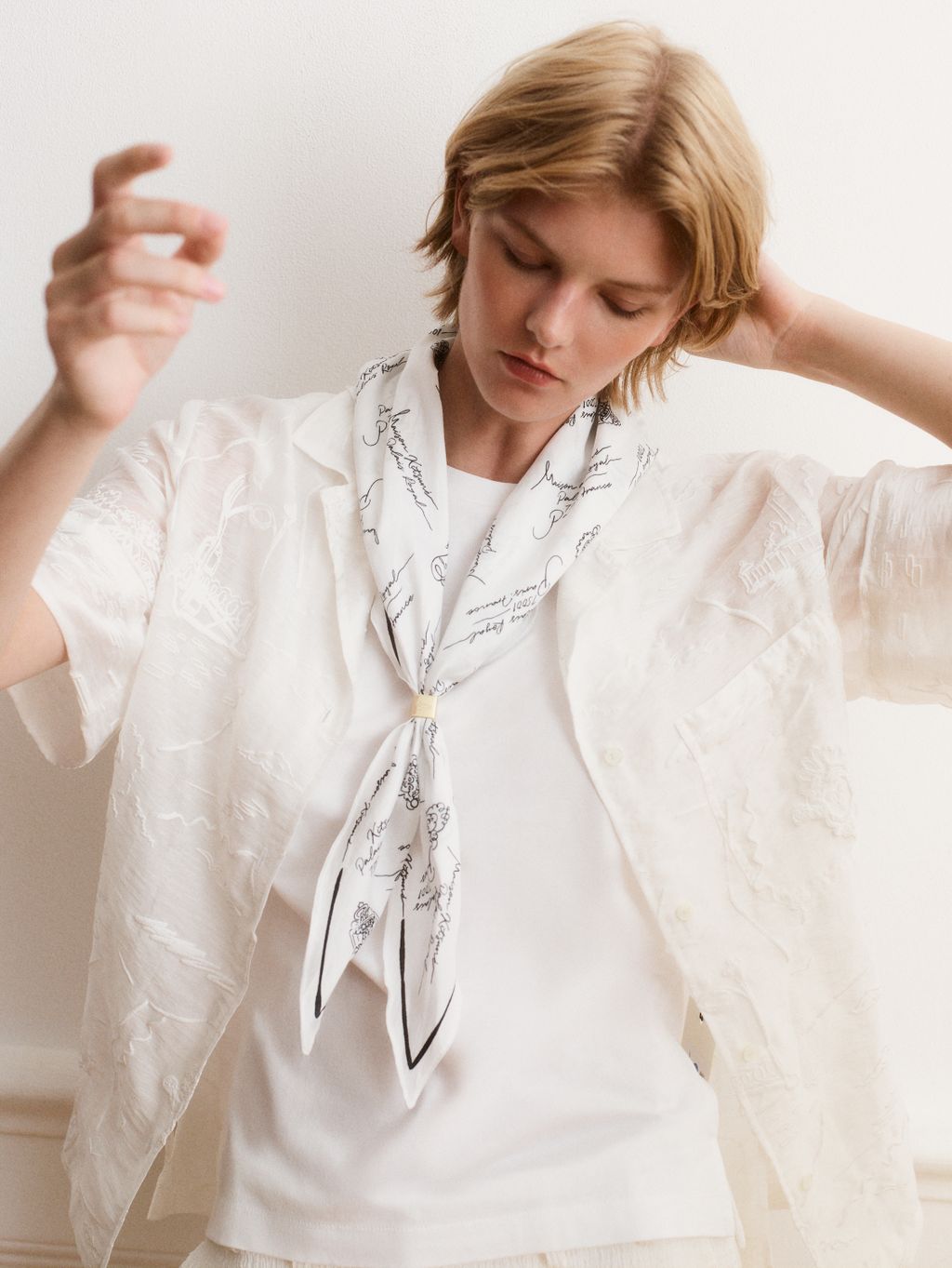 Fashion Week Paris Spring/Summer 2026 look 17 from the Maison Kitsuné collection womenswear