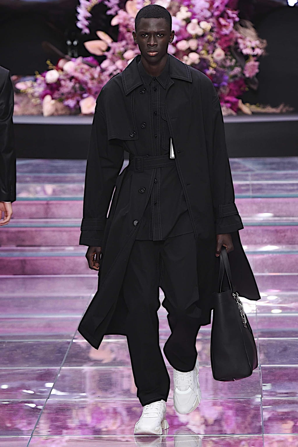 Khadim Sock walks the runway during the Louis Vuitton Menswear