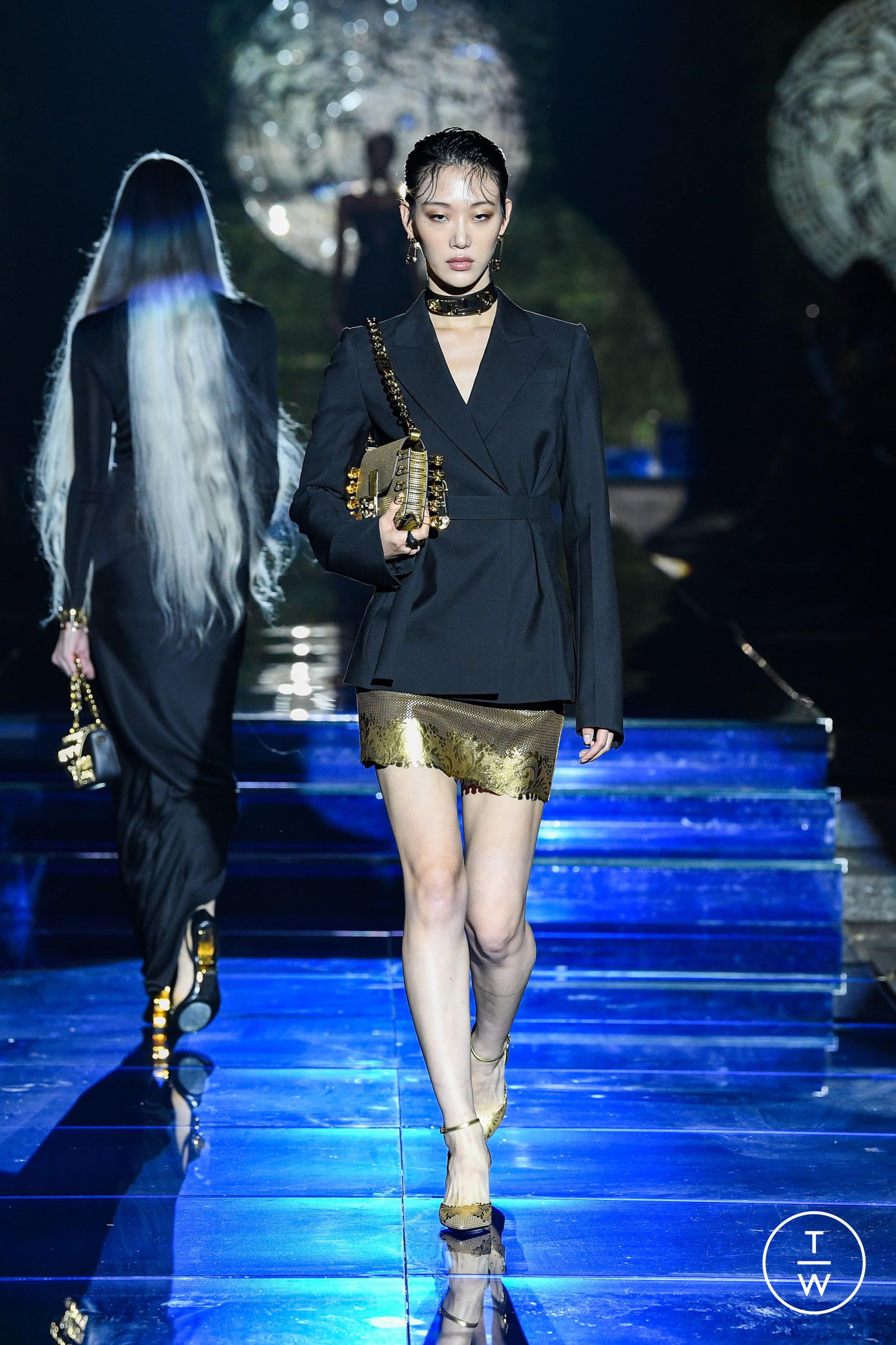 Sora Choi walks on the runway during the Versace Fashion show during Milan  Fashion Week Spring