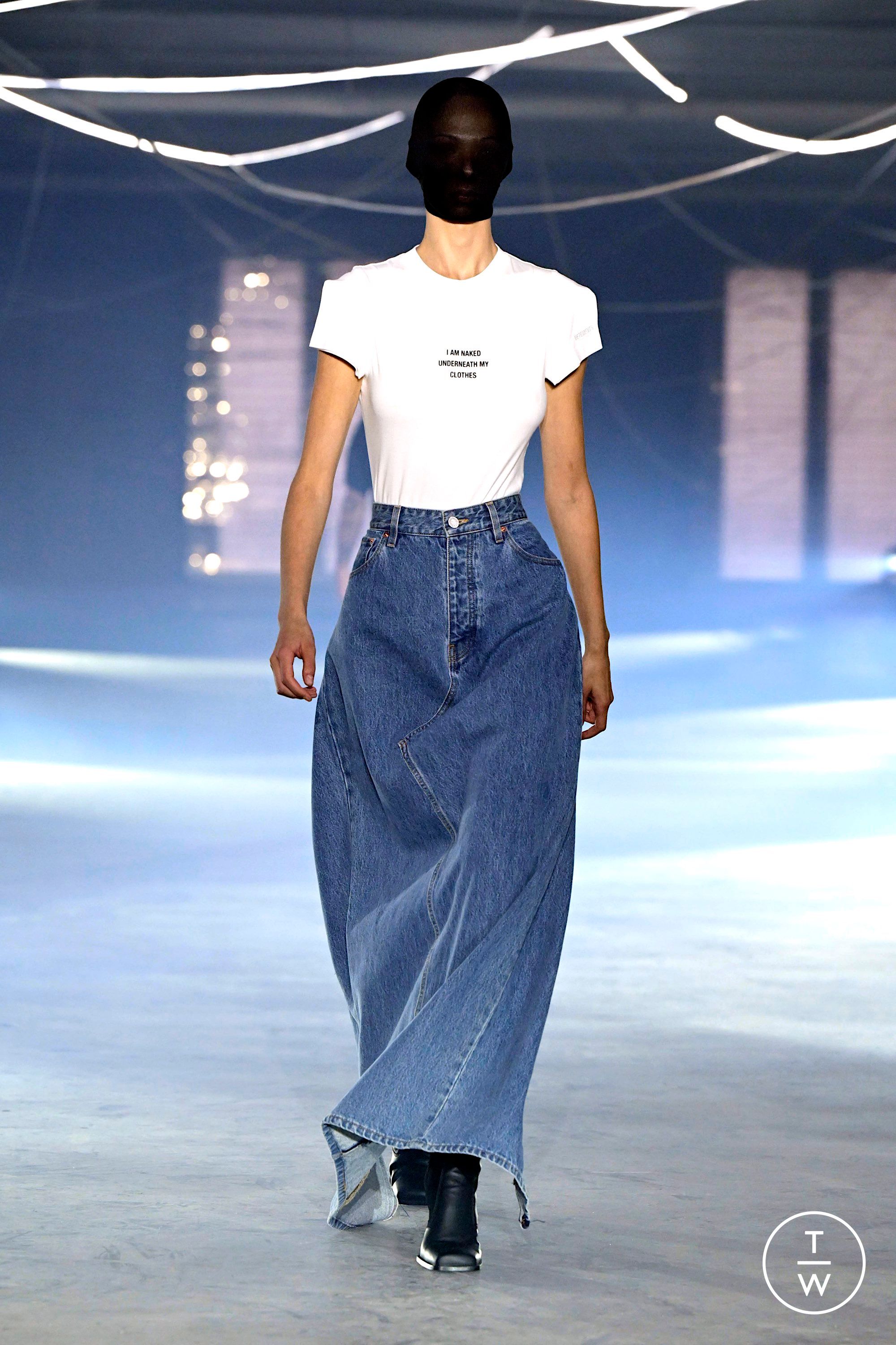 Vetements Spring Summer 2026 runway look featuring a text-first slogan T-shirt