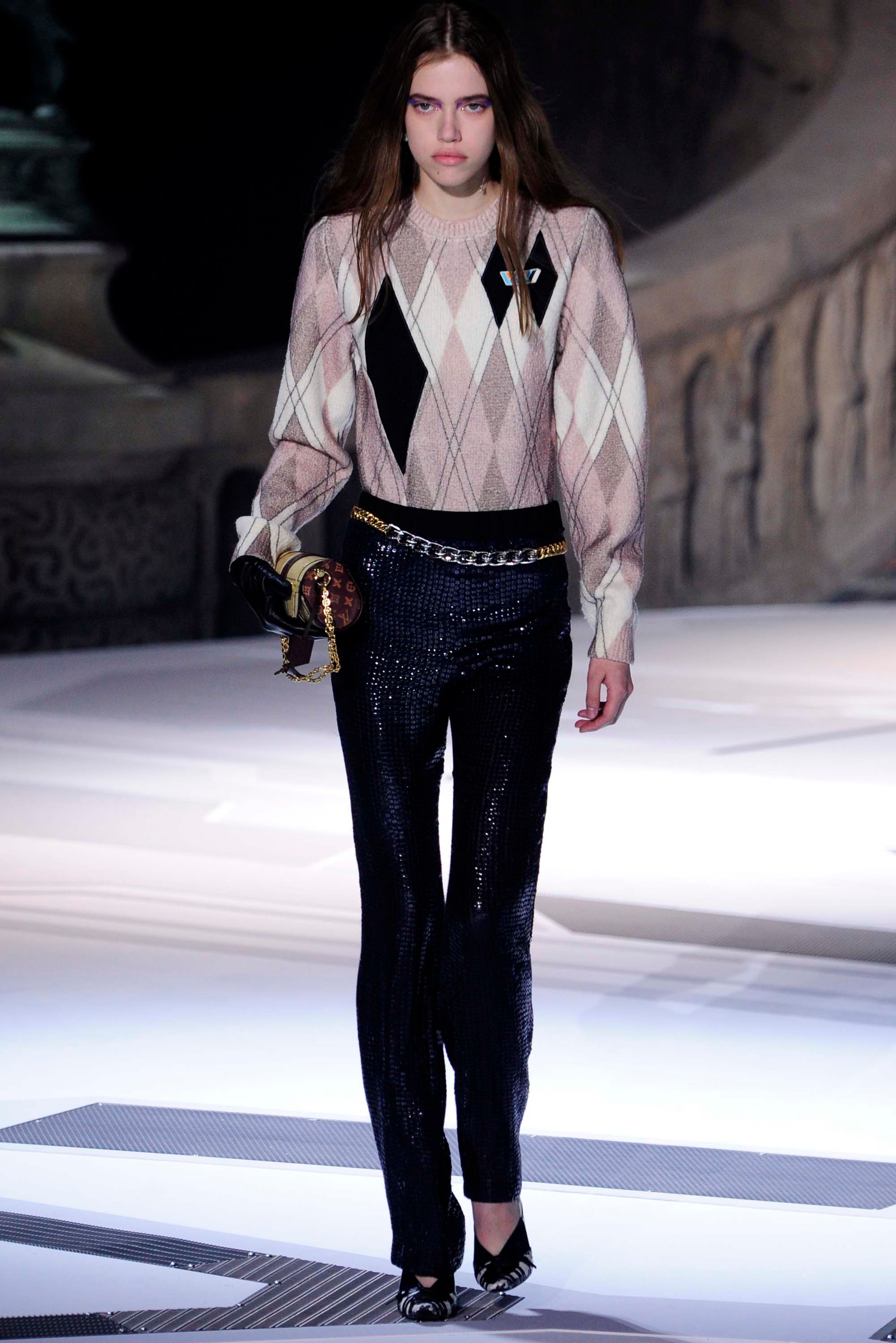 Masha Skokova walks on the runway during the Louis Vuitton Resort