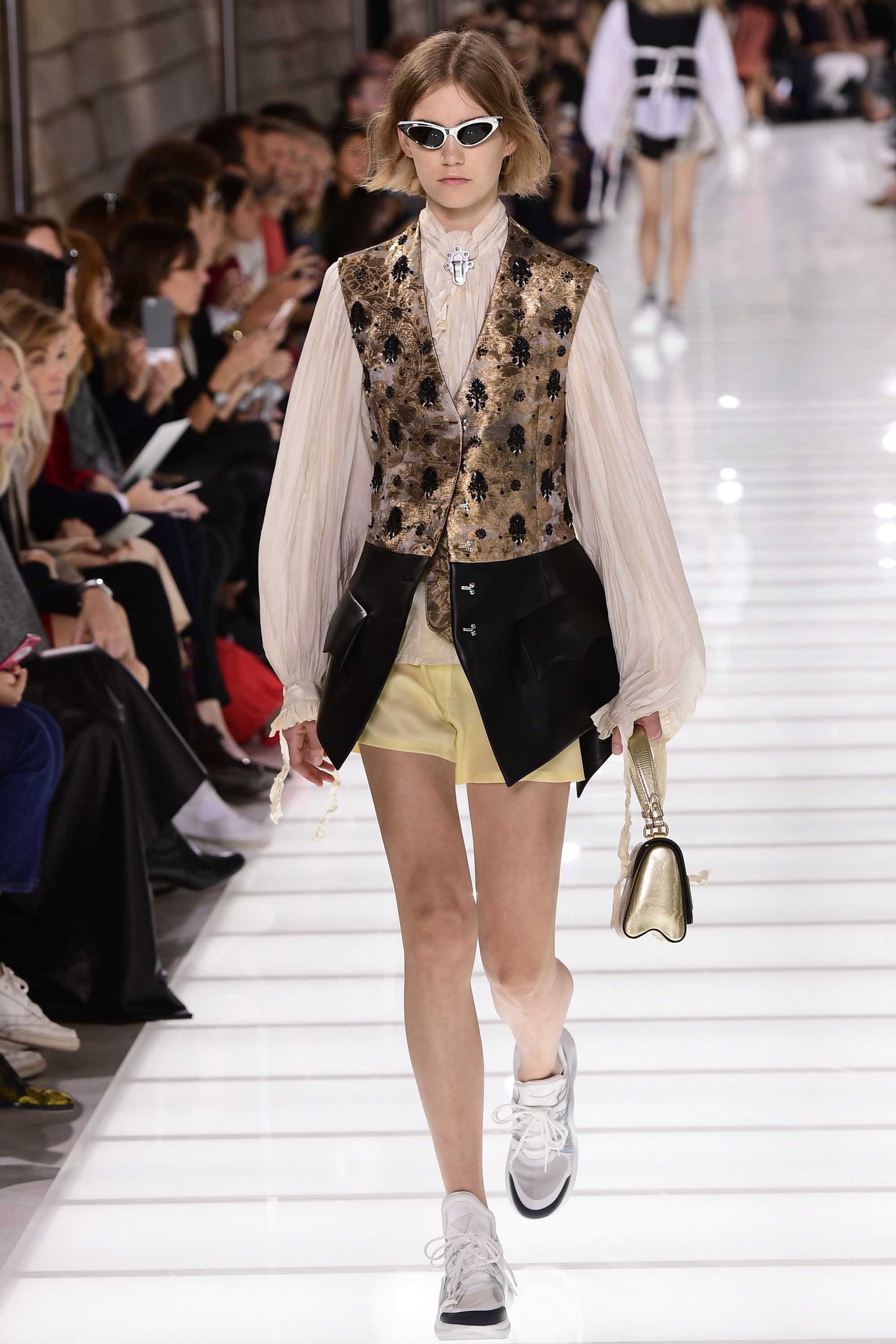 Model Erika Linder walks on the runway during the Louis Vuitton